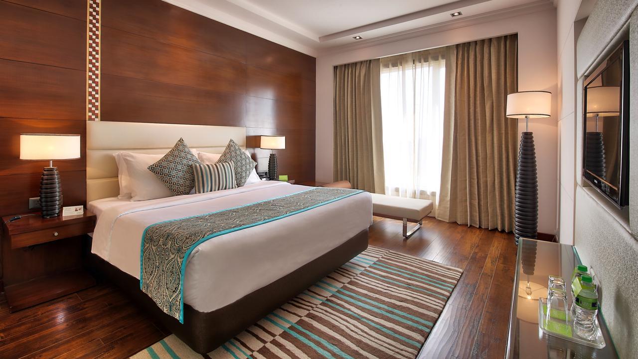 Radisson Jaipur City Center מראה חיצוני תמונה A bedroom at the hotel